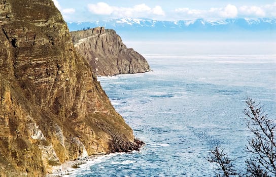 Spring on Baikal, ice and snow on the lake melt. The beauty of the nature of Baikal in the early spring.