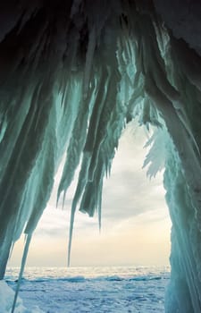 Winter on the Baikal, ice and snow on the lake. The beauty of the nature of Baikal in winter.