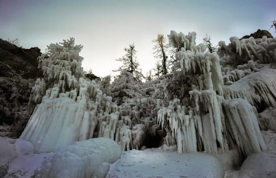 Winter on the Baikal, ice and snow on the lake. The beauty of the nature of Baikal in winter.