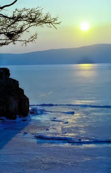Winter on the Baikal, ice and snow on the lake. The beauty of the nature of Baikal in winter.