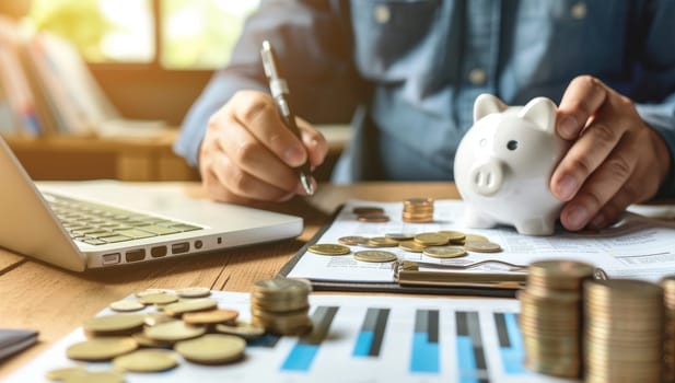 Man analyzing financial documents with piggy bank