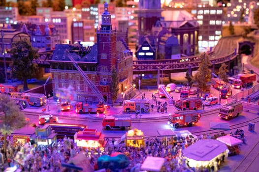 Miniatur Wunderland Hamburg in Germany, fire brigade department extinguishes fire, burning house, museum with miniature model construction of the world, 12.12.2023