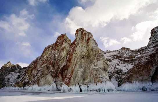 Winter on the Baikal, ice and snow on the lake. The beauty of the nature of Baikal in winter.