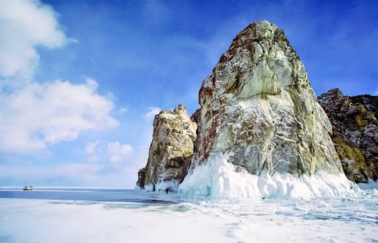 Winter on the Baikal, ice and snow on the lake. The beauty of the nature of Baikal in winter.