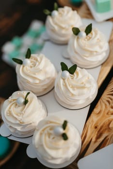 welcome buffet with alcohol and snacks, sandwiches, cupcakes