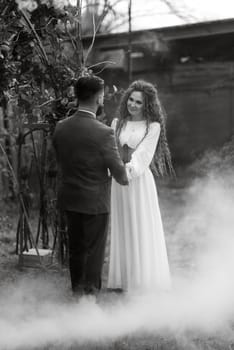 the first wedding dance of the bride and groom in the glade of the country club