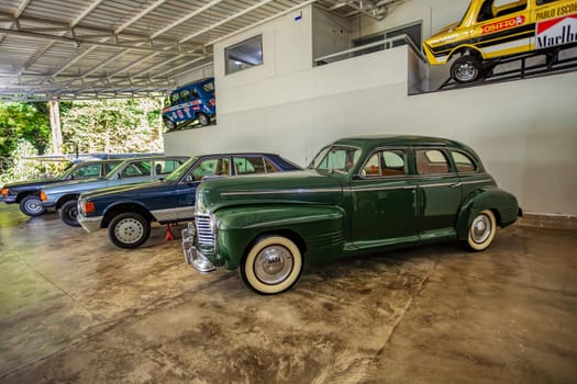 Medellin, Colombia - December 9, 2023: Vehicle fleet of famous drug dealer Pablo Escobar in Open-air museum.