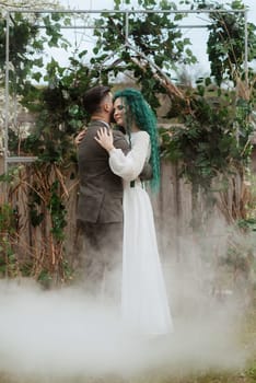 the first wedding dance of the bride and groom in the glade of the country club