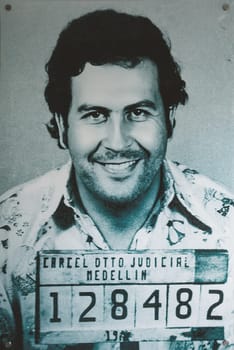 Medellin, Colombia - December 9, 2023: Police photo of rested famous drug dealer Pablo Escobar in Open-air museum.