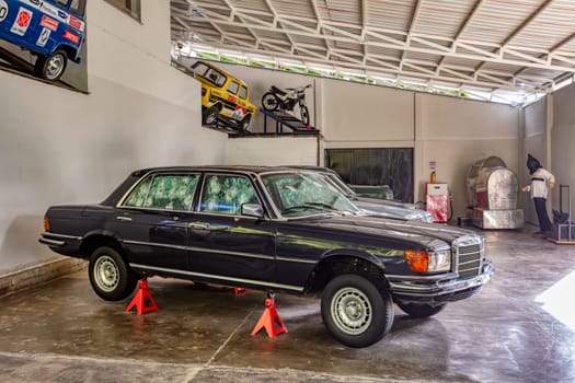 Medellin, Colombia - December 9, 2023: Car shot up of famous drug dealer Pablo Escobar in Open-air museum.