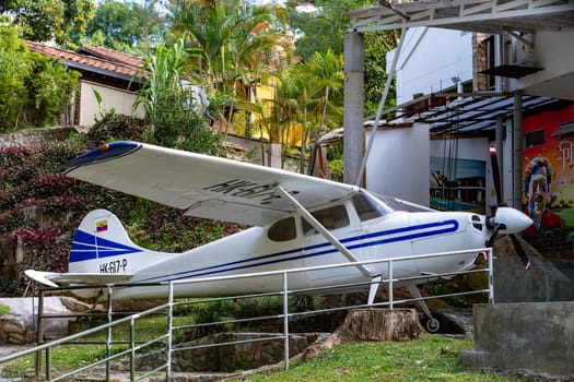 Medellin, Colombia - December 9, 2023: The plane he used to transport drugs famous drug dealer Pablo Escobar in Open-air museum.