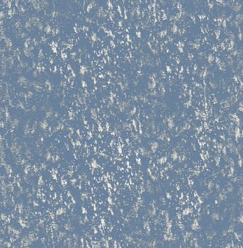 The background rough texture of the wall is blue with white spots on the surface in close-up
