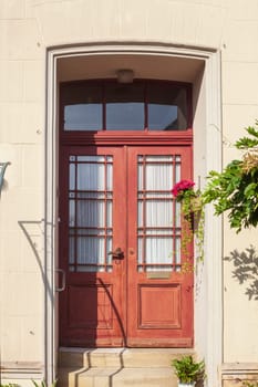 Reddish old wooden door, house entrance, Elsfleth, Wesermarsch, Lower Saxony, Germany