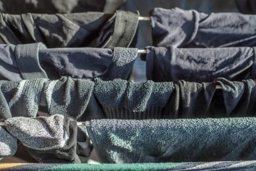 Hanging laundry on a clothesline, Germany
