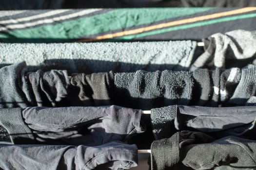 Hanging laundry on a clothesline, Germany