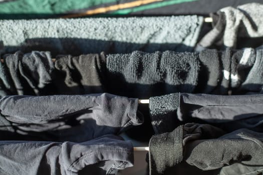 Hanging laundry on a clothesline, Germany