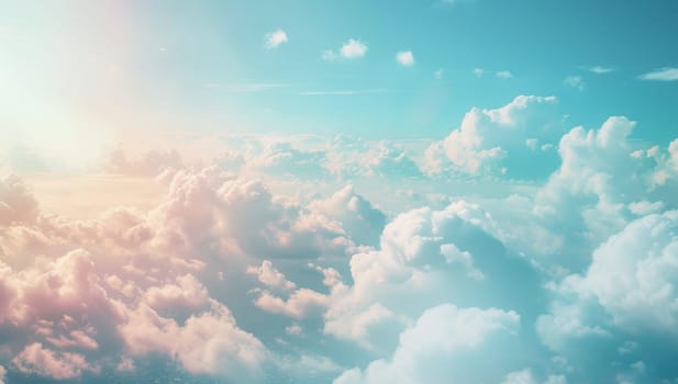 Sunny sky above fluffy clouds creates a serene landscape