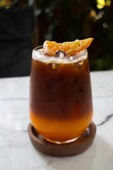 Orange juice espresso with ice, stock photo