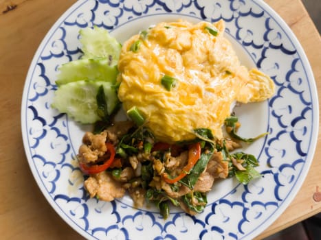Spicy Thai basil with pork and egg, stock photo