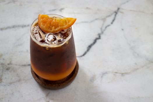 Orange juice espresso with ice, stock photo