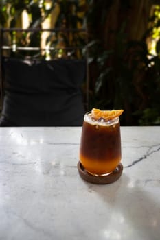 Orange juice espresso with ice, stock photo
