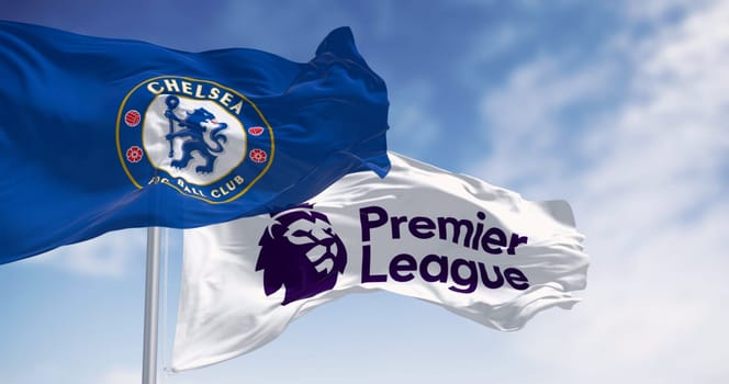 London, UK, July 12 2023: Chelsea Football Club and Premier League flags waving on a clear day. Rippled Fabric. Selective focus. Illustrative editorial 3d illustration render