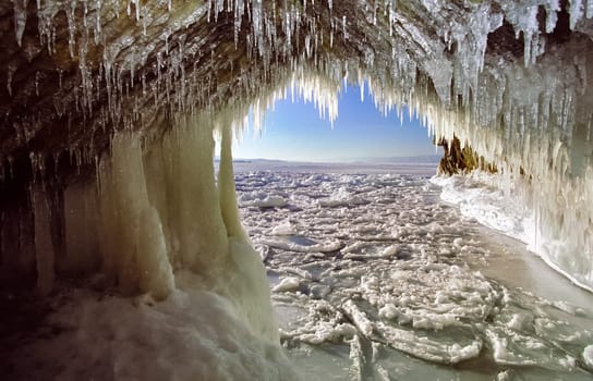 Winter on the Baikal, ice and snow on the lake. The beauty of the nature of Baikal in winter.