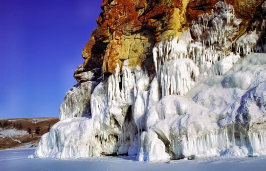 Winter on the Baikal, ice and snow on the lake. The beauty of the nature of Baikal in winter.