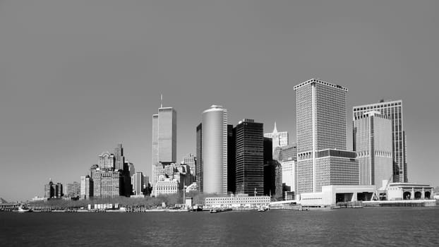 New York, USA - January 1, 2019: view to downtown Manhattan with skyline and World trade center under clear blue sky.