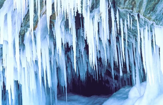 Winter on the Baikal, ice and snow on the lake. The beauty of the nature of Baikal in winter.