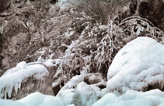 Winter on the Baikal, ice and snow on the lake. The beauty of the nature of Baikal in winter.