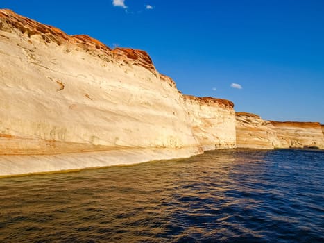 Lake Powell is based on Colorado River with a great view on the canyoon. Beautiful canyon and lonely rocks on the Lake Powell, Utah.