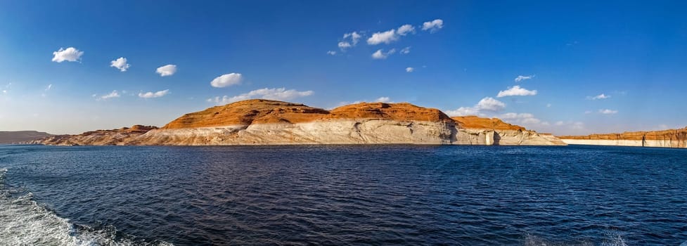 Lake Powell is based on Colorado River with a great view on the canyoon. Beautiful canyon and lonely rocks on the Lake Powell, Utah.