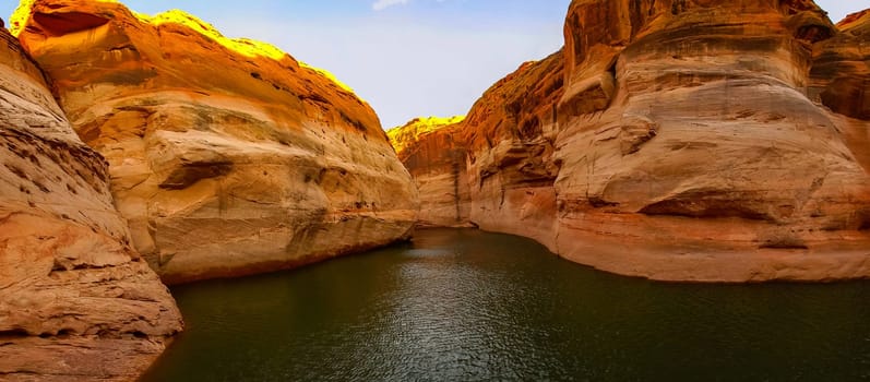 Lake Powell is based on Colorado River with a great view on the canyoon. Beautiful canyon and lonely rocks on the Lake Powell, Utah.