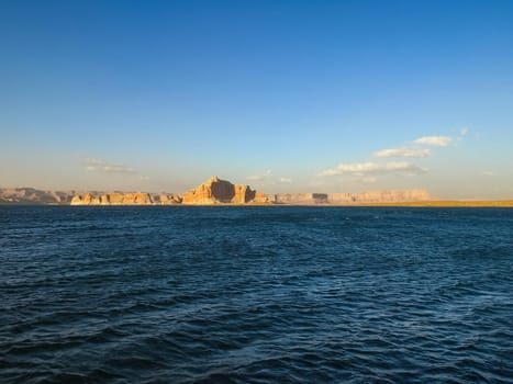 Lake Powell is based on Colorado River with a great view on the canyoon. Beautiful canyon and lonely rocks on the Lake Powell, Utah.