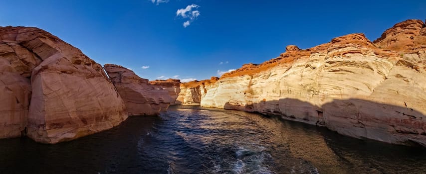 Lake Powell is based on Colorado River with a great view on the canyoon. Beautiful canyon and lonely rocks on the Lake Powell, Utah.