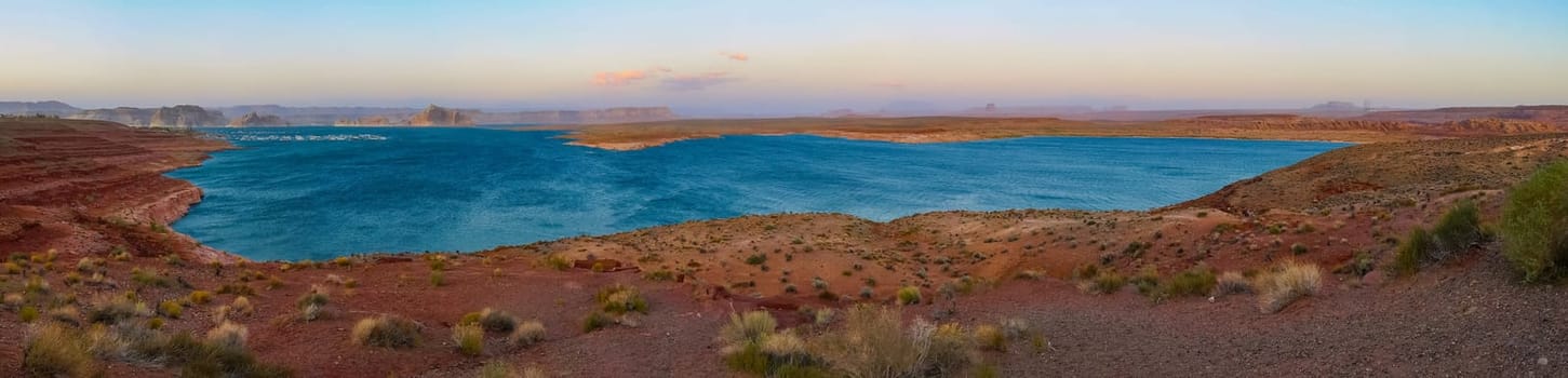 Lake Powell is based on Colorado River with a great view on the canyoon. Beautiful canyon and lonely rocks on the Lake Powell, Utah.