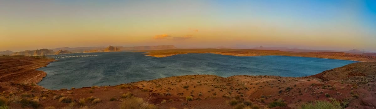 Lake Powell is based on Colorado River with a great view on the canyoon. Beautiful canyon and lonely rocks on the Lake Powell, Utah.