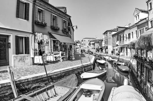 Venice, Italy - April 10, 2007: beautiful colored houses of the old fishermans city of Burano in the laguna of Venice, Italy. Venice is the most visited touristic spot in Italy.