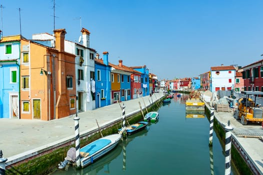 Venice, Italy - April 10, 2007: beautiful colored houses of the old fishermans  city Burano in the laguna of Venice, Italy. Venice is the most visited touristic spot in Italy.