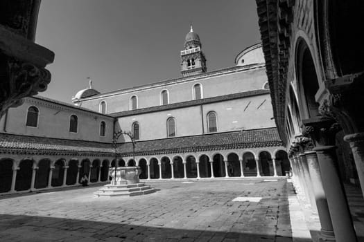 Venice, Italy -April 10, 2007: courtyard at the church of San Michele cemetery ground.  San Michele is since centuries the most important cemetery of Venice.