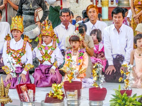 Rangoon, Myanmar - April 18, 2007: people visit golden shwedagon pagoda in Rangoon for a ceremony, Rangoon, Myanmar.