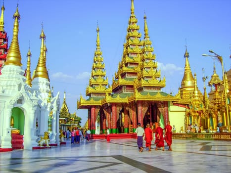 Rangoon, Myanmar - April 18, 2007: people visit golden shwedagon pagoda in Rangoon for a ceremony, Rangoon, Myanmar.