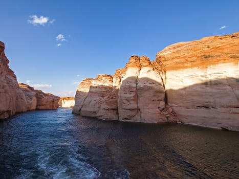Lake Powell is based on Colorado River with a great view on the canyoon. Beautiful canyon and lonely rocks on the Lake Powell, Utah.