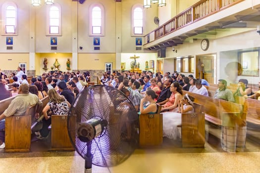 Los Angeles, USA - July 5, 2008: people join the service in the church Nuestra Señora la Reina de los Ángeles - Our Lady Queen of Angels - at Olvera street, the old mexican part of Los Angeles.