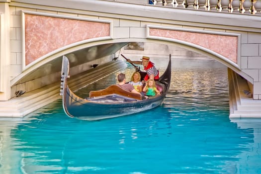 Las Vegas, USA - July 17, 2008: Venice Theme Venetian with Gondola on water and Caesars Casino Hotel in Las Vegas, Nevada.