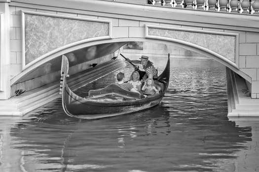 Las Vegas, USA - July 17, 2008: Venice Theme Venetian with Gondola on water and Caesars Casino Hotel in Las Vegas, Nevada.