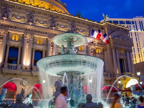 Las Vegas, USA - July 17, 2008: hotel Paris with french fountain in Las Vegas, USA. The fountain is a replica of the fountain at the place de la republiqie in Paris.