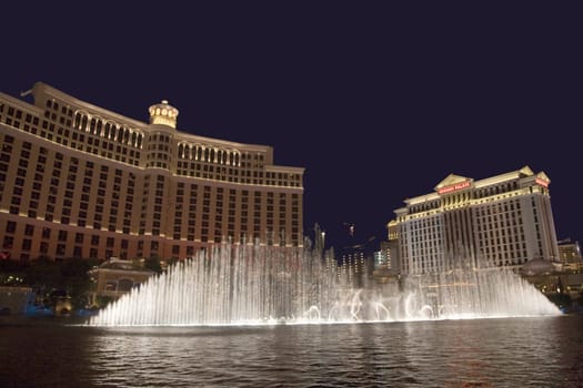 Las Vegas, USA - July 17, 2008: Las Vegas Bellagio Hotel Casino, featured with its world famous fountain show, at night with fountains in Las Vegas, Nevada.