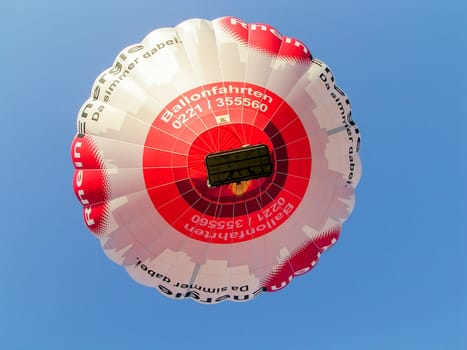 Frankfurt, Germany - October 25, 2008: scenic hot air balloon in Hesse starts in late afternoon light